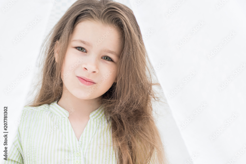 Close up portrait of beautiful little cute preschooler girl on white background. Happy childhood concept. Close up portrait of beautiful little cute preschooler girl on white background. Happy childhood concept.