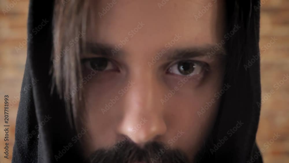 Black eyes of mad man with mustache, madness Black eyes of mad man with mustache, madness
