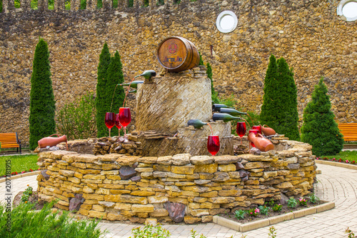 MOLDOVA, MILESTII MICI 2018: beautiful view to wine fountain outside the winery on AUGUST 3, 2012 in Milestii Mici, Moldavia. Milestii Mici has the worlds largest underground wine storage cave network