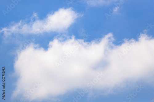 Big white clouds in the summer sky.