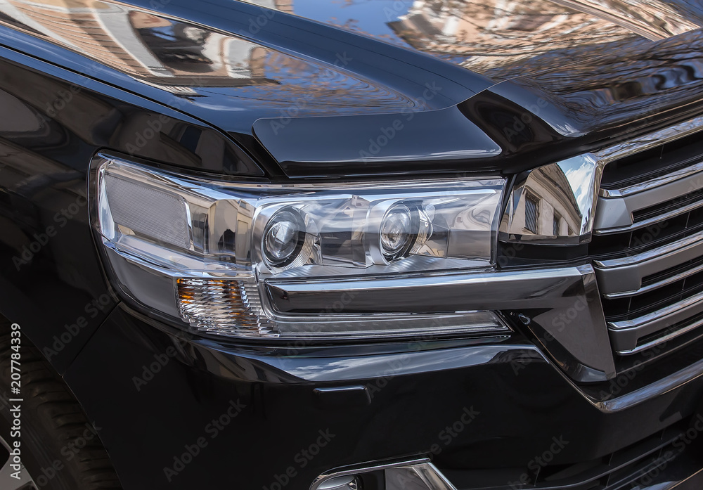 headlight of prestigious car close up