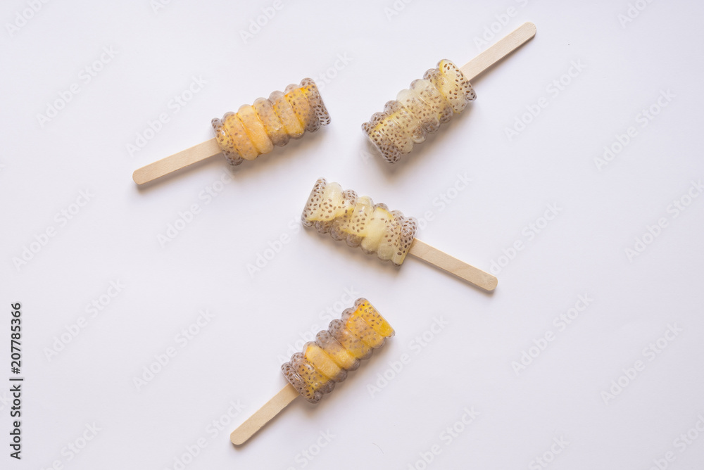 Popsicle of orange and lemon with chia Popsicle of orange and lemon with chia