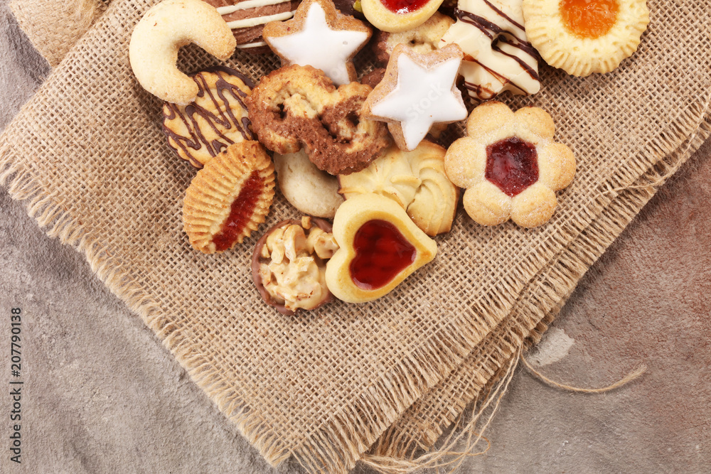 Fototapeta premium Mixed Christmas cookies. Colorful mix of Christmas-themed decorated cookies