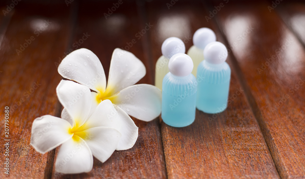 Plumeria flowers with shower cream in spar concept.
