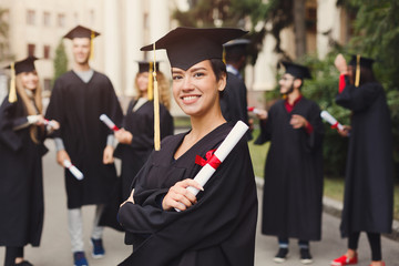 Happy young woman on her graduation day