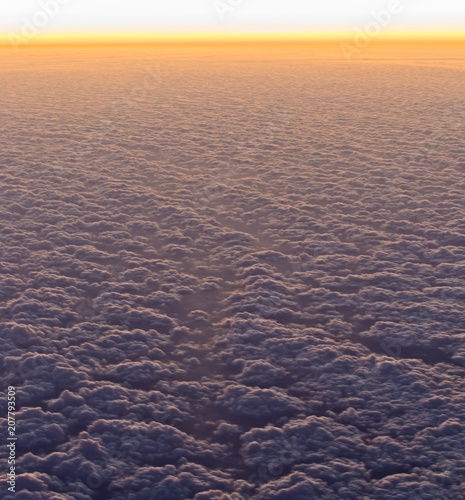 Cloudscape at dawn  in-flight shot.