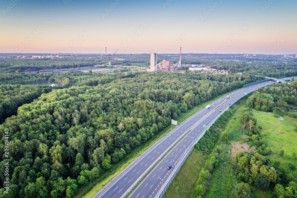 Aerial view on A4 motorway through Silesia and coal mine.