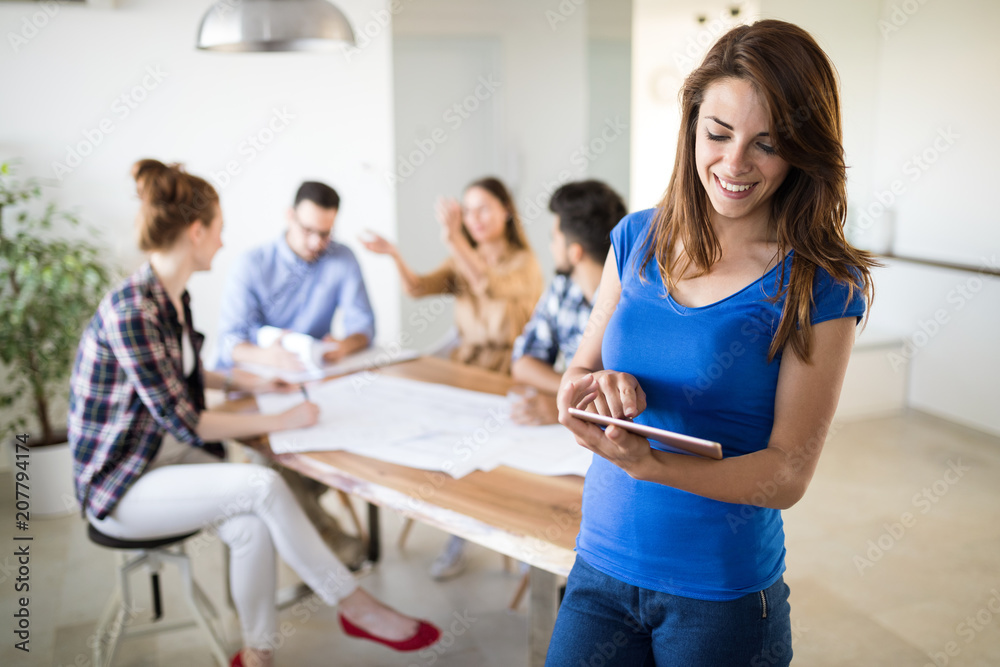 Creative coworkers working in office