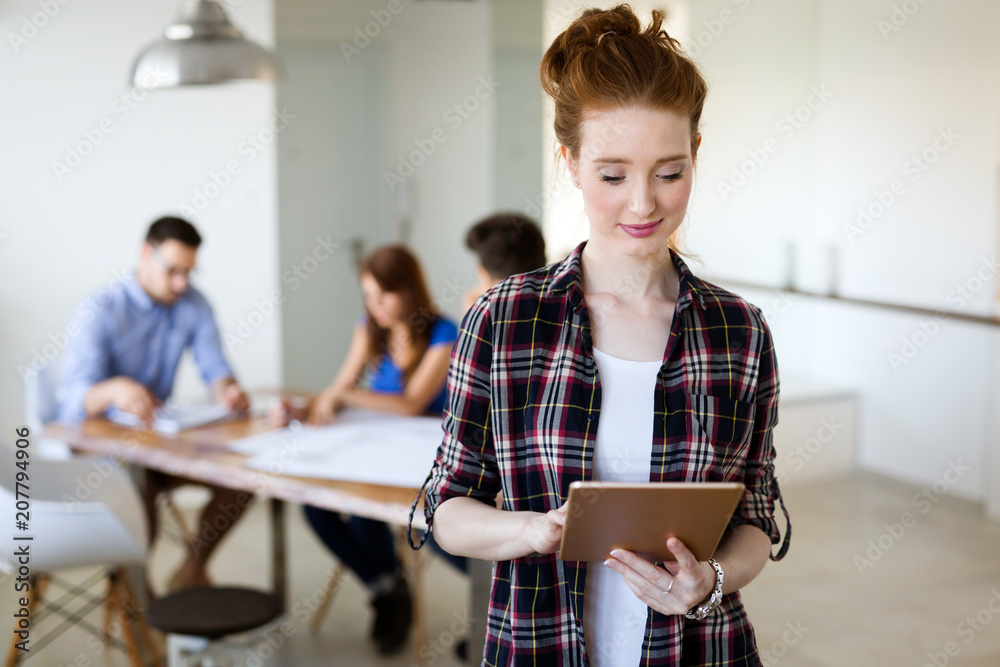 Coworking process, designers team working in modern office Coworking process, designers team working in modern office