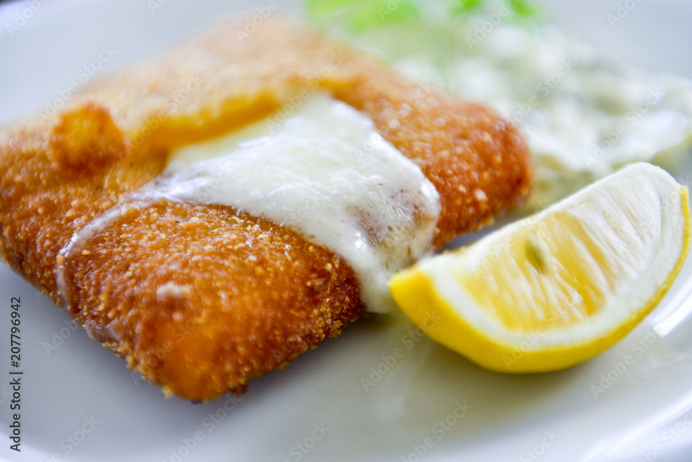fried cheese, mayonnaise, parsley ,lemon, plate fried cheese, mayonnaise, parsley ,lemon, plate