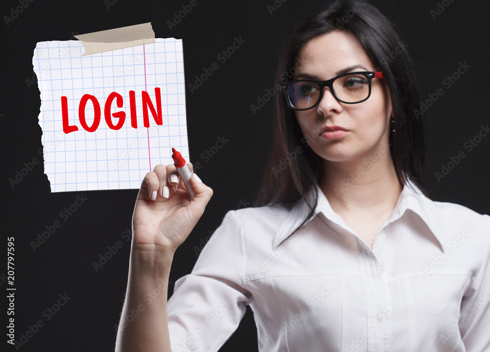 The concept of marketing, technology, the Internet and the network. A young businessman shows what is important for business: Login The concept of marketing, technology, the Internet and the network. A young businessman shows what is important for business: Login