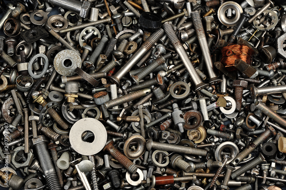 heap of iron nuts, bolts, details - abstract background heap of iron nuts, bolts, details - abstract background