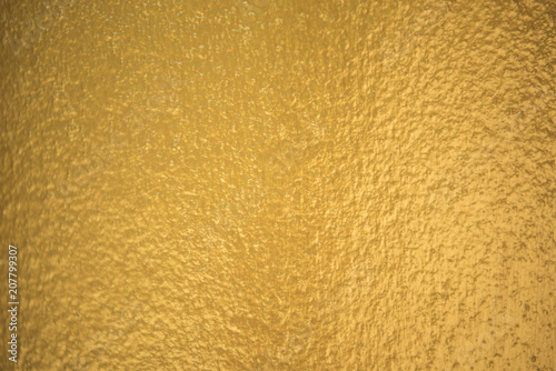 Yellow concrete wall for texture background. © NaMong Productions
