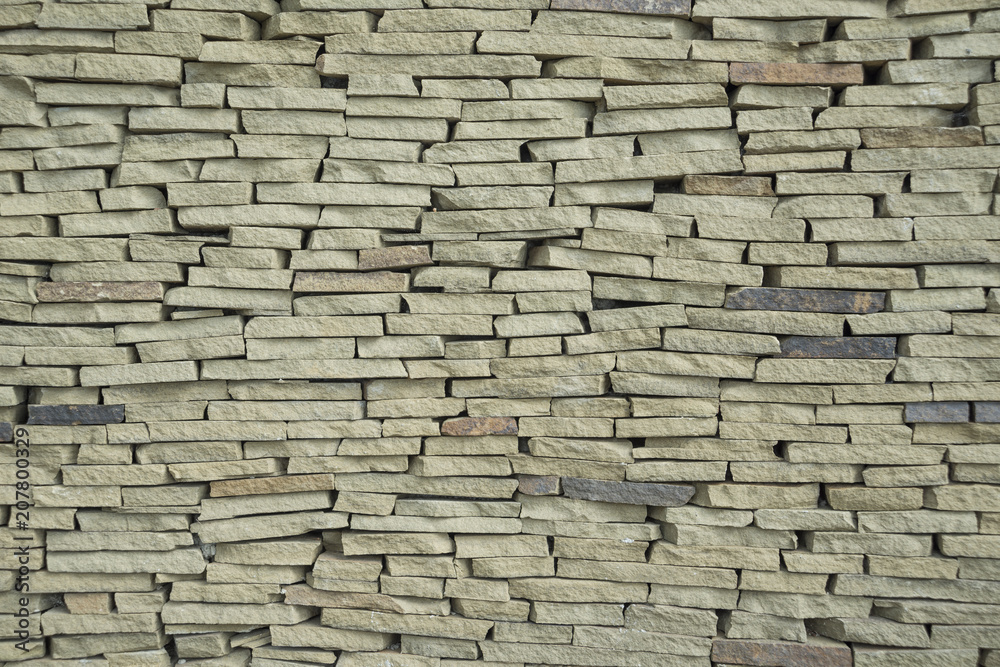 Obraz premium The texture of a wall made of stone slate