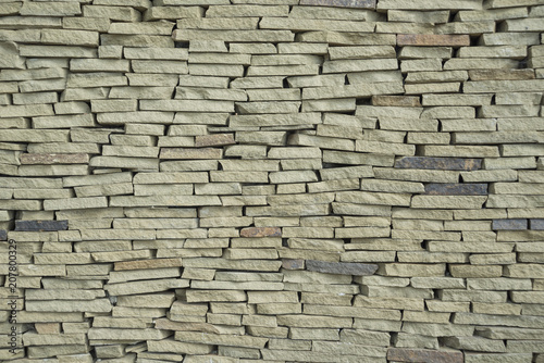 The texture of a wall made of stone slate