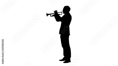 Silhouette Man standing and trumpet melody.