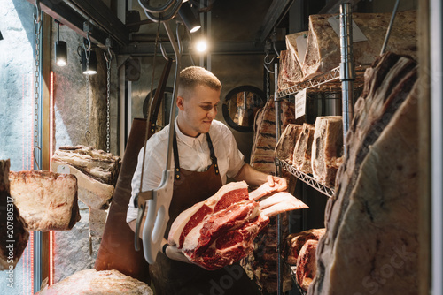 Butcher working in the Madrid city photo