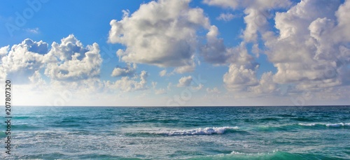 Beautiful seascape view with blue cloudy sky