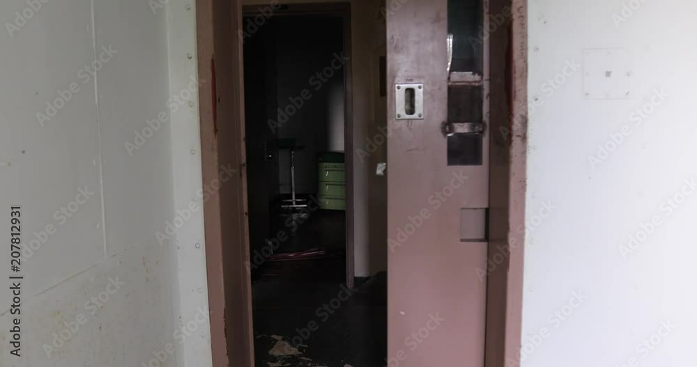 Door closing on cell door of old prison. Door closing on cell door of old prison.