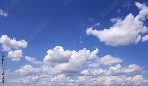 Blue sky with white clouds as background
