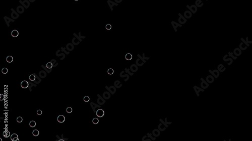 A lot of little soap bubbles fly on the left side. Loop animation on black background. Can be use with any footage by doing a composite add as decoration. Bubble bursting motion