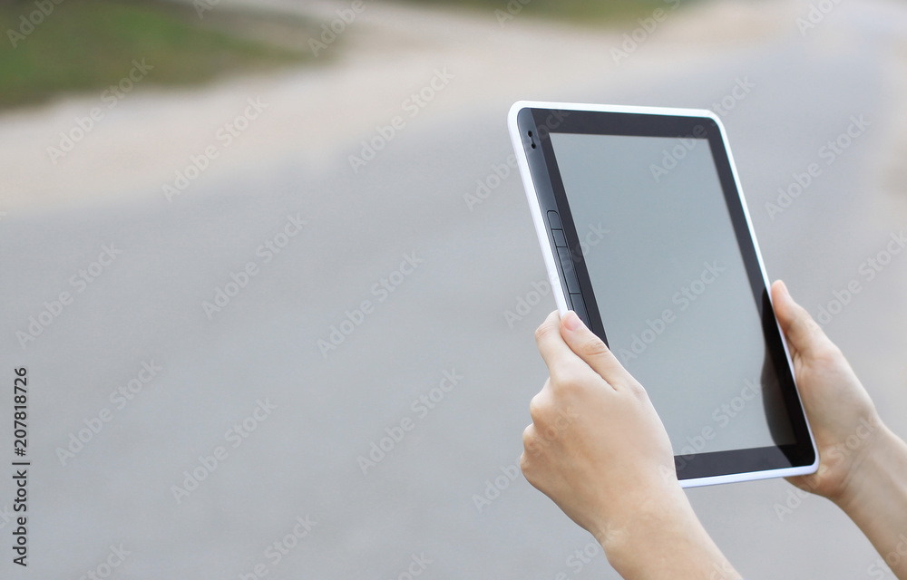 people and technology .closeup of person holding digital tablet