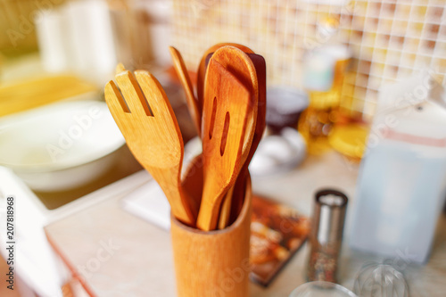 Wooden kitchen utensils close view