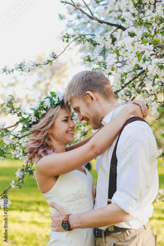 Happy couple. Loving couple enjoying in moments of happiness in the park. Love and tenderness, dating, romance. Lifestyle concept