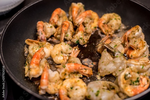 Jumbo Shrimp Scampi Sauteeing in Butter and Olive Oil