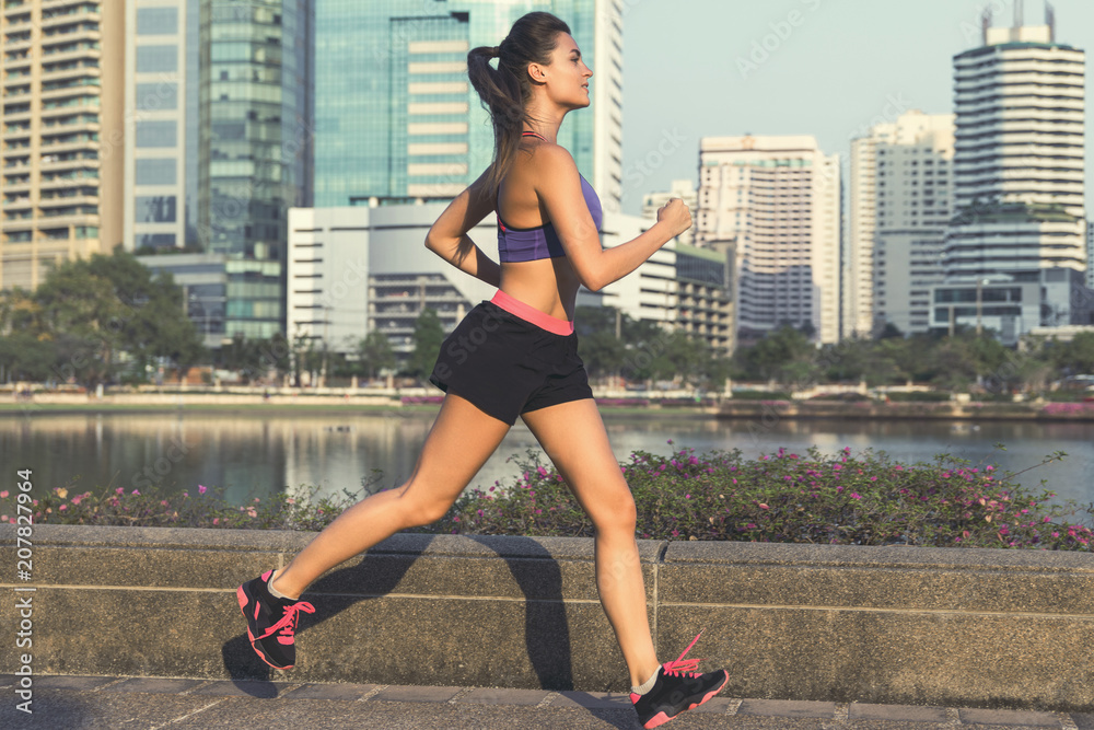 Woman in the city during her running workout