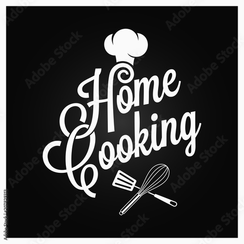 Home cooking vintage lettering with kitchen utensils on dark background