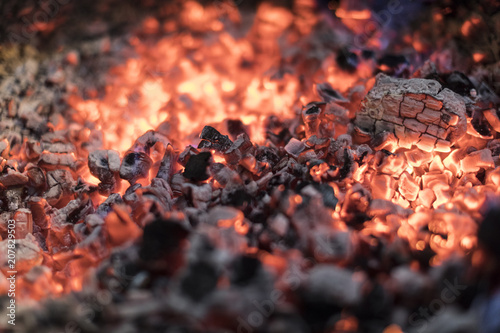 Burning charcoal with a shallow depth of field.