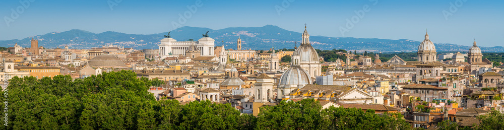 Rome skyline as seen from Castel Sant'Angelo, with the dome of Saint Agnese Church, the Campidoglio, the Altare della Patria monument and the dome of Pantheon.