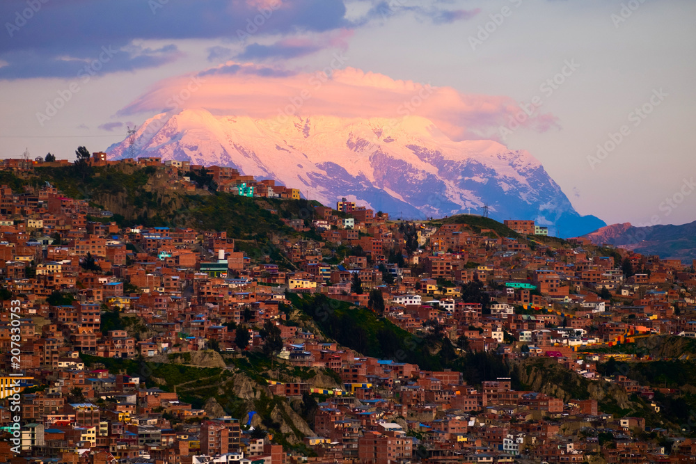 City of La Paz and mountain of Illimani during sunset. Bolivia