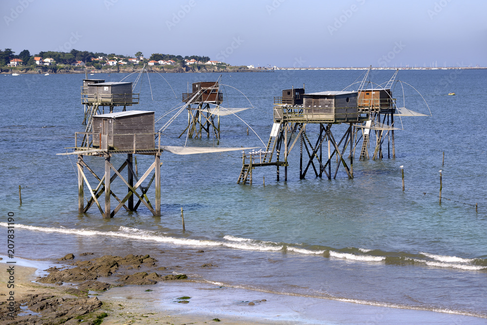 Fishing carrelets at Saint-Michel-Chef-Chef in the Loire-Atlantique department in western France. Fishing carrelets at Saint-Michel-Chef-Chef in the Loire-Atlantique department in western France.