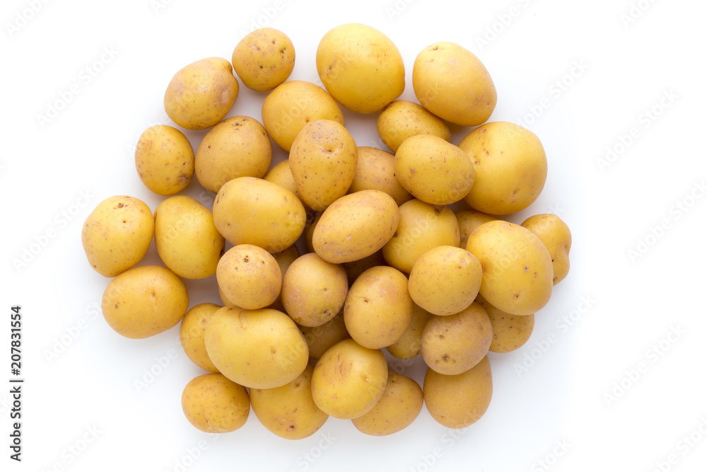 Young potato isolated on white background. Harvest new. Flat lay, top view Young potato isolated on white background. Harvest new. Flat lay, top view