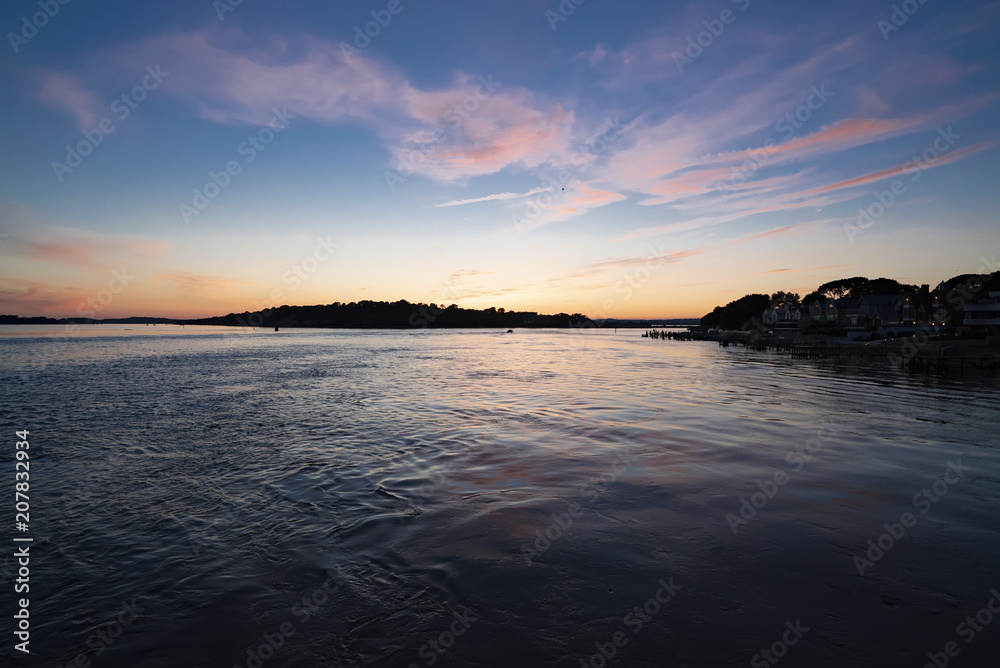 Vibrant sunset over Poole Harbor in Dorset Vibrant sunset over Poole Harbor in Dorset