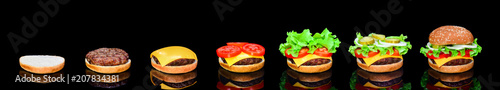 Process making of burger, step by step isolated on black background. Burger wide banner. Split burger. Burger divided in parts