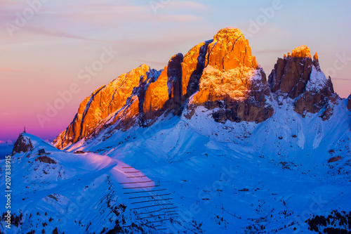 Sunset view of Belvedere valley near Canazei of Val di Fassa, Dolomites, Italy photo