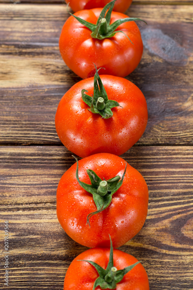 Tasty red ripe tomatoes gourmato from Belgium close up, ingredients for healthy salad close up top view Tasty red ripe tomatoes gourmato from Belgium close up, ingredients for healthy salad close up top view