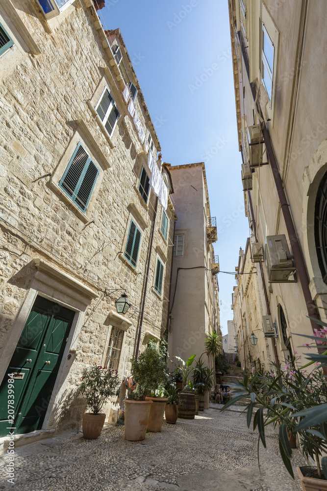 An alley in Dubrovnik, Croatia on a bright sunny day.