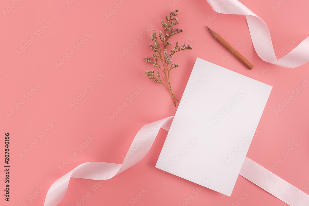 A wedding mock up concept. Wedding Invitation, envelopes, cards Papers on pink background with ribbon and decoration. Top view, flat lay, copy space A wedding mock up concept. Wedding Invitation, envelopes, cards Papers on pink background with ribbon and decoration. Top view, flat lay, copy space