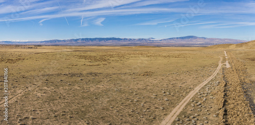 Panorama of dry desert plain during the California drought in central plain.