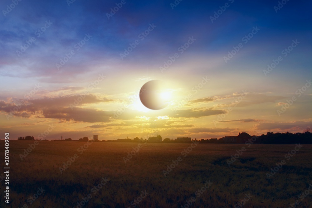 Scientific natural phenomenon. Total solar eclipse with diamond ring effect glowing on sky. Scientific natural phenomenon. Total solar eclipse with diamond ring effect glowing on sky.