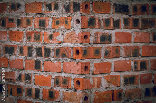 Cornor of Black and red brick wall texture background photo