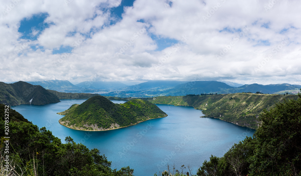 Panoramic of Cuicocha, beautiful blue lagoon inside the crater of Cotacachi volcano near Otavalo