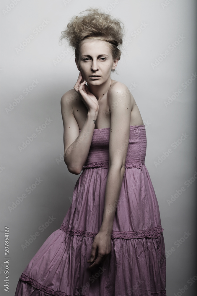 Fototapeta premium Beautiful female fashion model posing