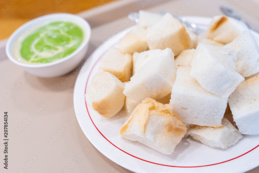 Steam bread with green custard dipping Steam bread with green custard dipping