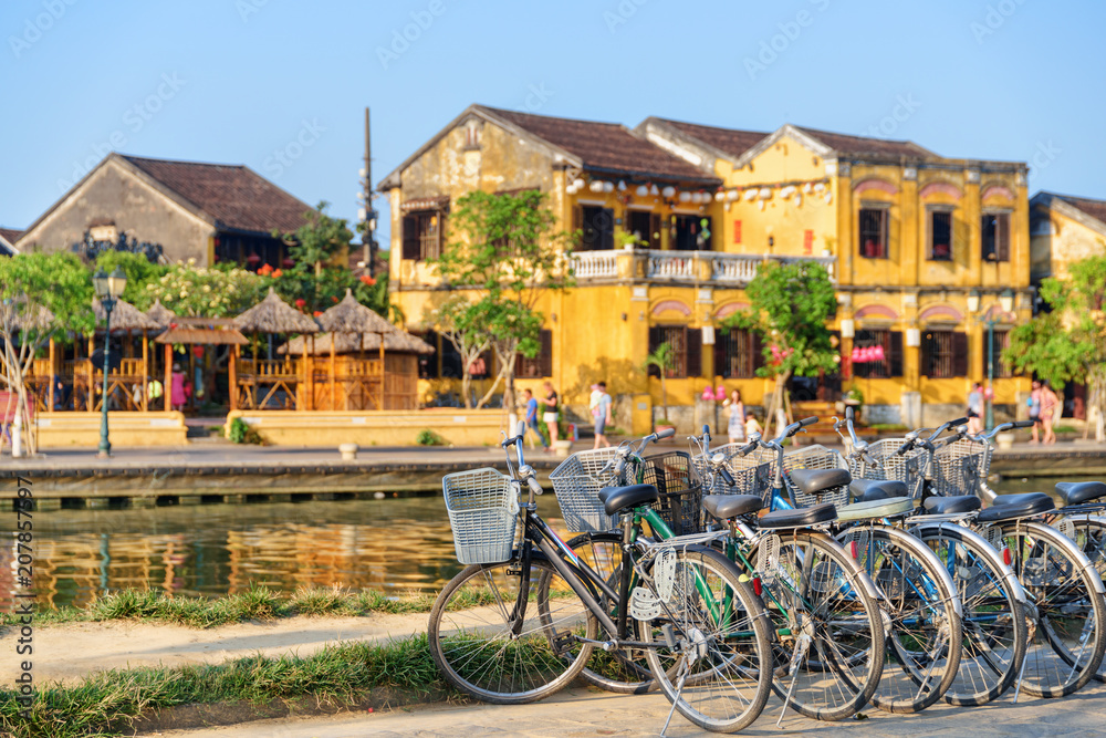 Bicycles parked beside the Thu Bon River, Hoi An