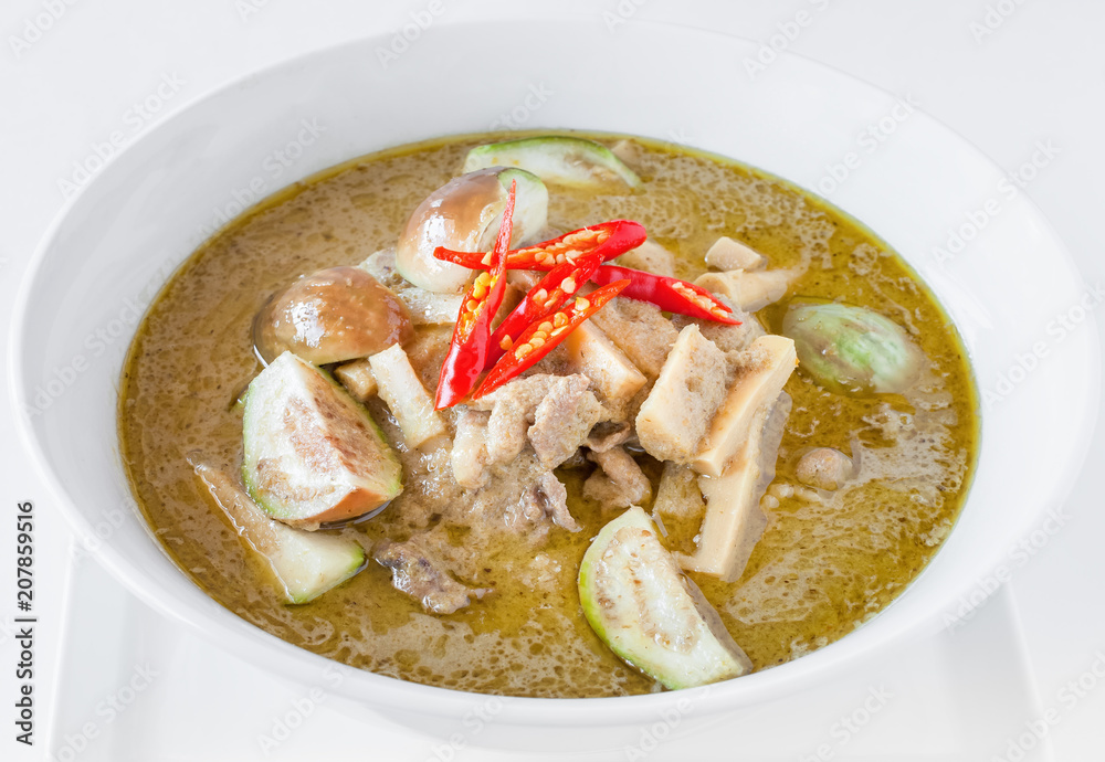Green chicken curry with eggplant and pickled bamboo shoot. Green curry is a Central Thai variety of curry Green chicken curry with eggplant and pickled bamboo shoot. Green curry is a Central Thai variety of curry